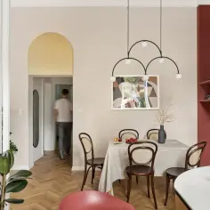Złoty łuk nad drzwiami dodaje elegancji. Zobacz, jak ozdobić łuk w mieszkaniu, tworząc stylowe przejście.